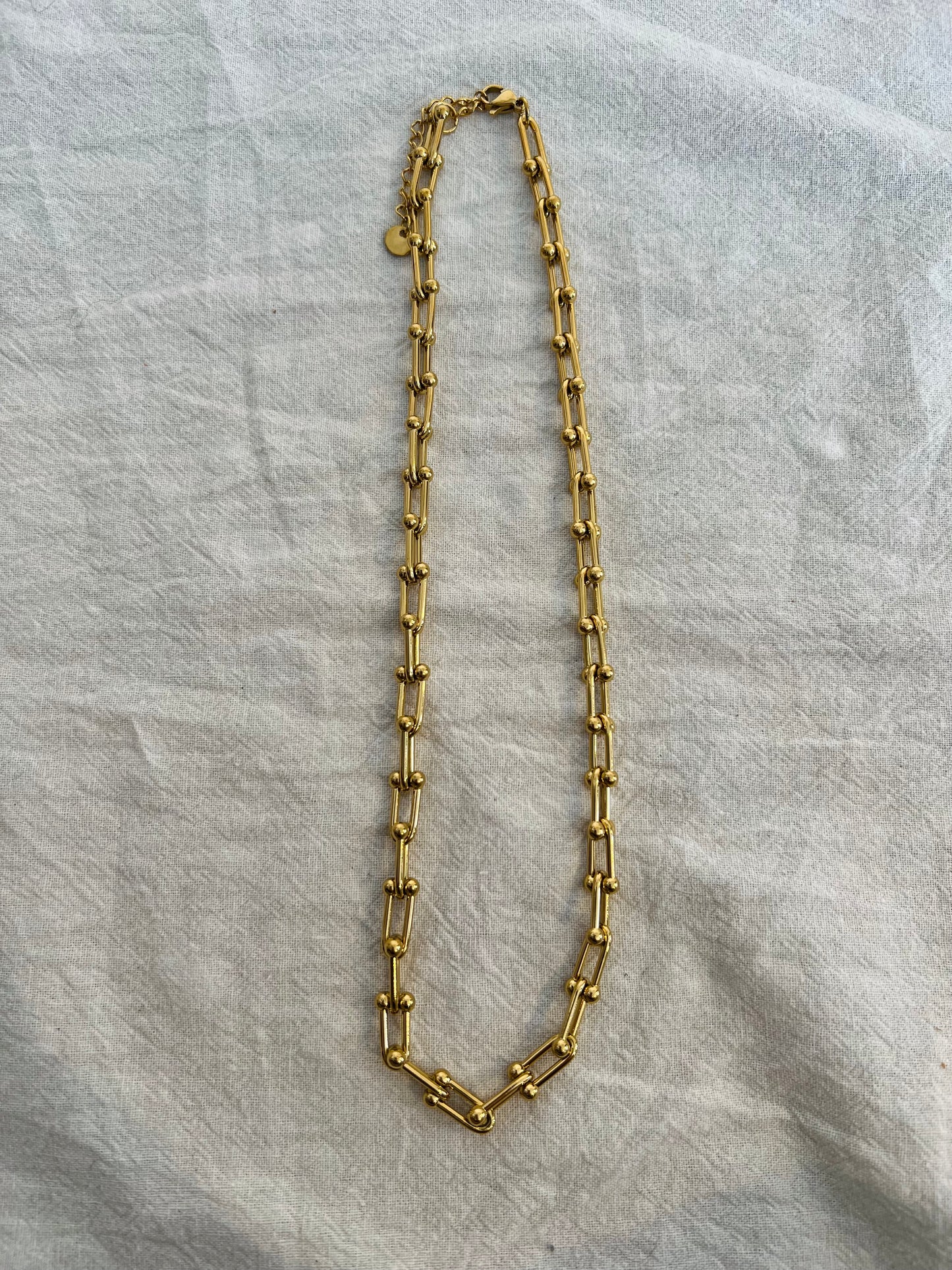 Chain bricked gold